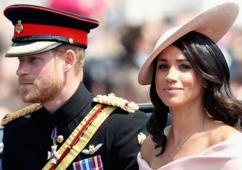 Príncipe Harry junto a Meghan Markle