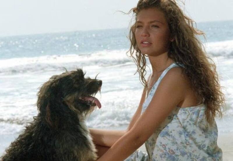 Thalía se ponía salchichas en el cabello para mantener la atención del perro.