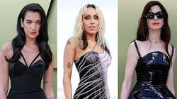 Anne Hathaway estremece con su mini y Dua Lipa y Miley Cirus relucen elegantes en desfile de Versace