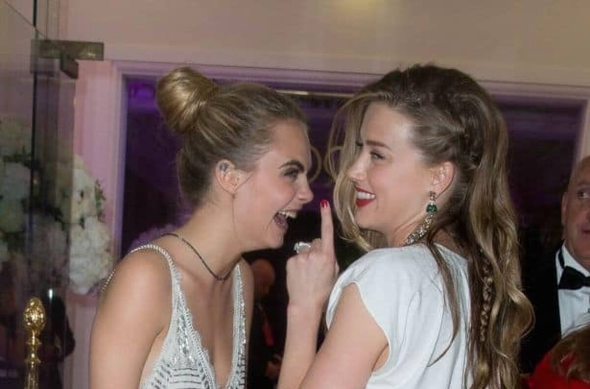 Salen a la luz fotografías de Amber Heard besando supuestamente a Cara Delevigne