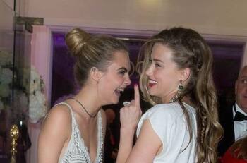 Salen a la luz fotografías de Amber Heard besando supuestamente a Cara Delevigne