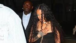 Rihanna aparece descuidada en Miami; debe sujetarse vestido y equivoca medida del calzado