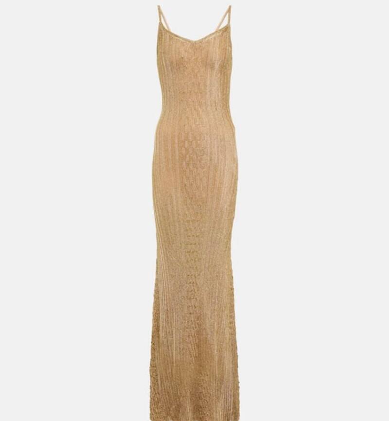 La joven lució este vestido en la boda de Marc Piqué, diseño de Victoria Beckham